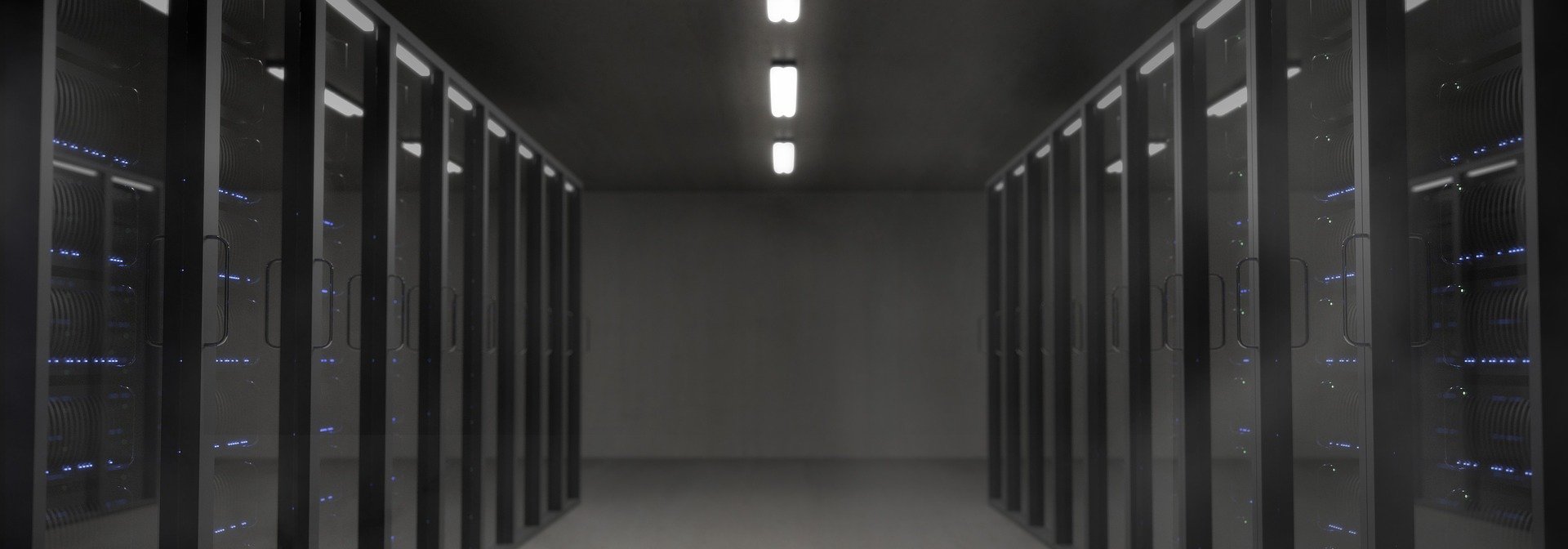 Image of a space with many servers. A server room.