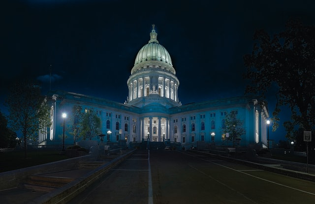 Image of the United States Capitol Building at night.