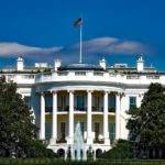 Photo of the front of The White House and lanscaping in front of The White House.